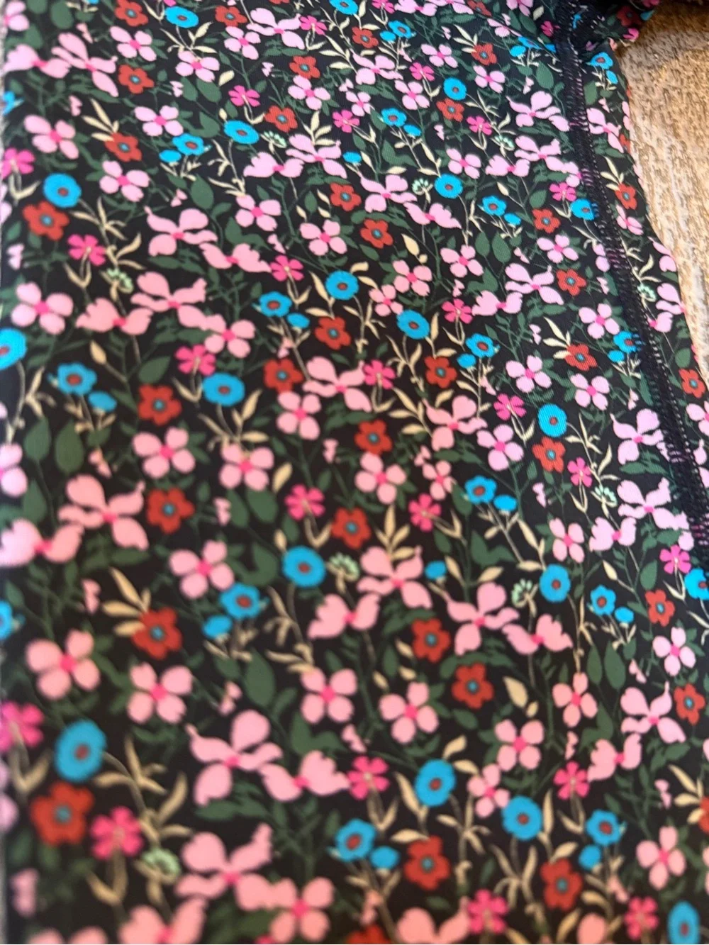 Nike Black Floral Leggings with Pink and Teal Accents